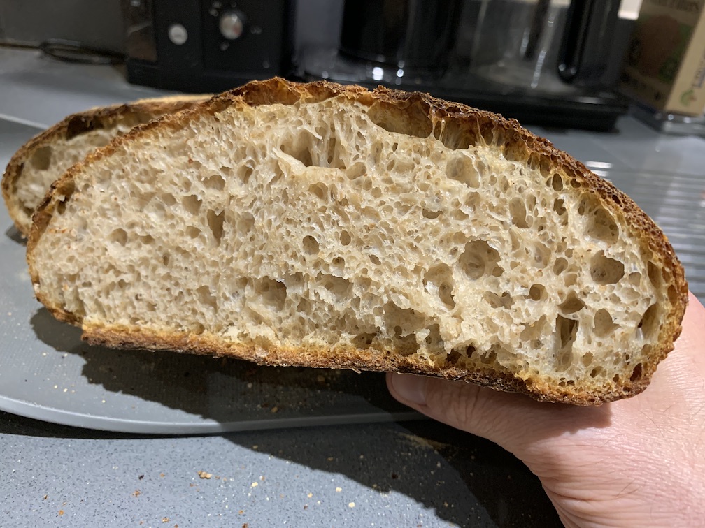 The same loaf cut in half to show the crumb