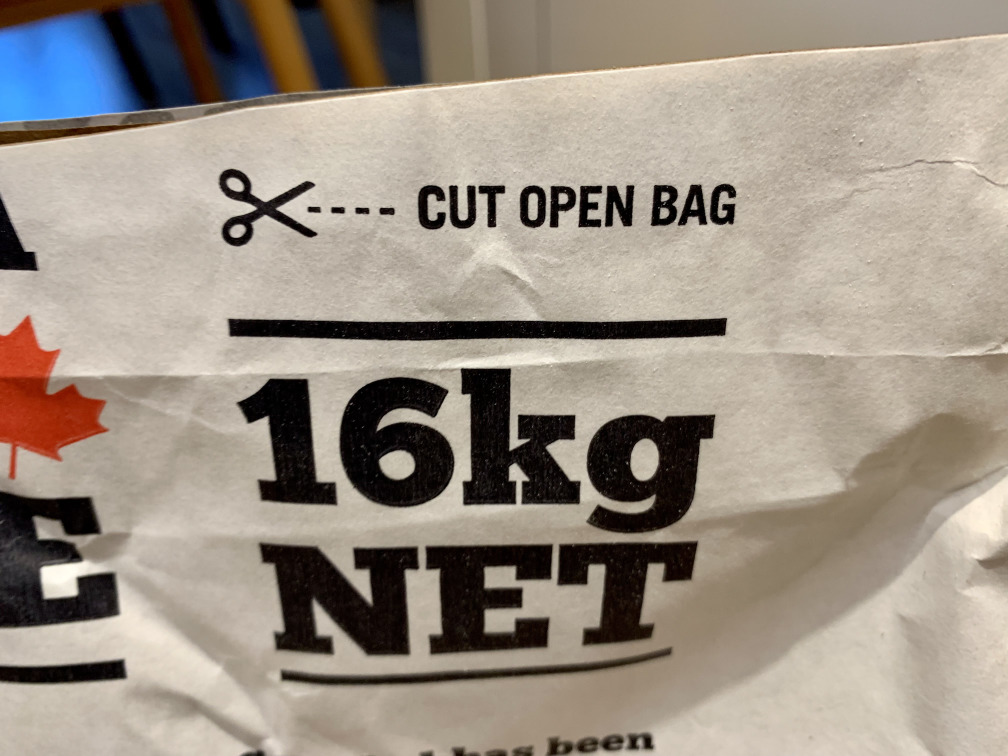 “✂️ CUT OPEN BAG” printed on a 16kg bag of flour