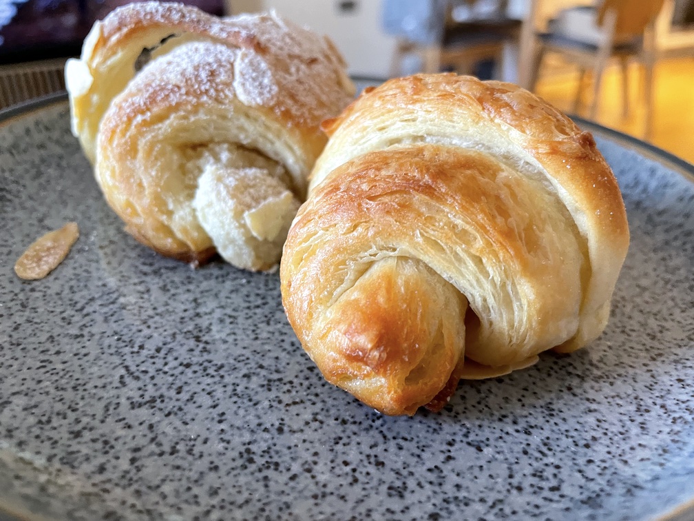 Two croissants on a plate