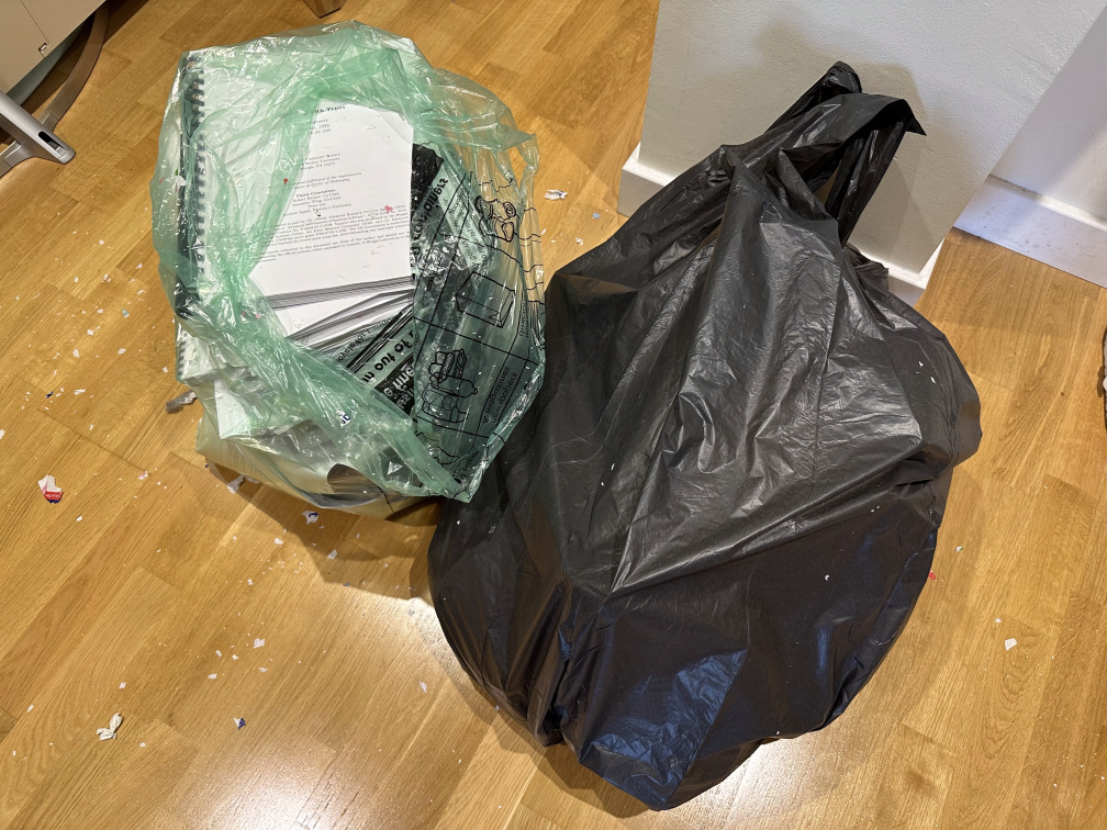 Two bin bags filled with papers & notes from my PhD studies