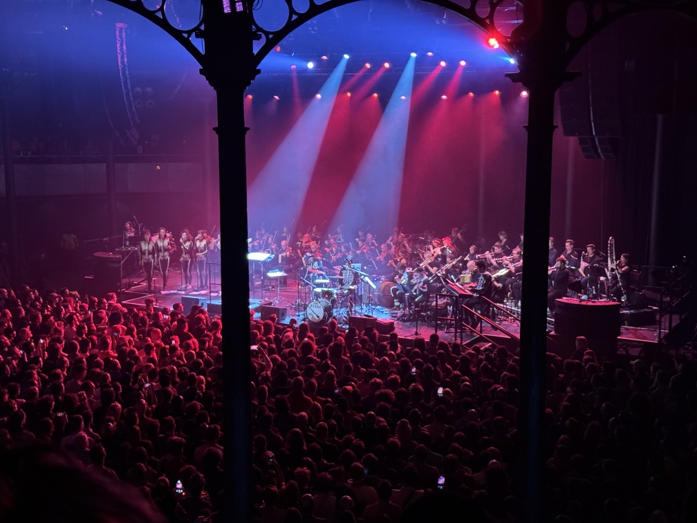 Louis Cole and the orchestra performing
