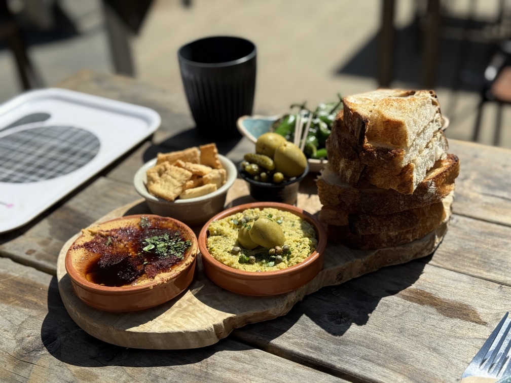 A “veggie sharing board (made vegan)” in the sunshine