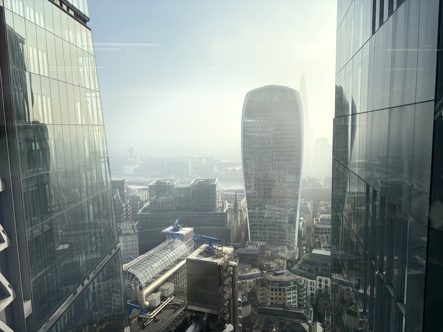 A misty view south across the Thames towards London Bridge