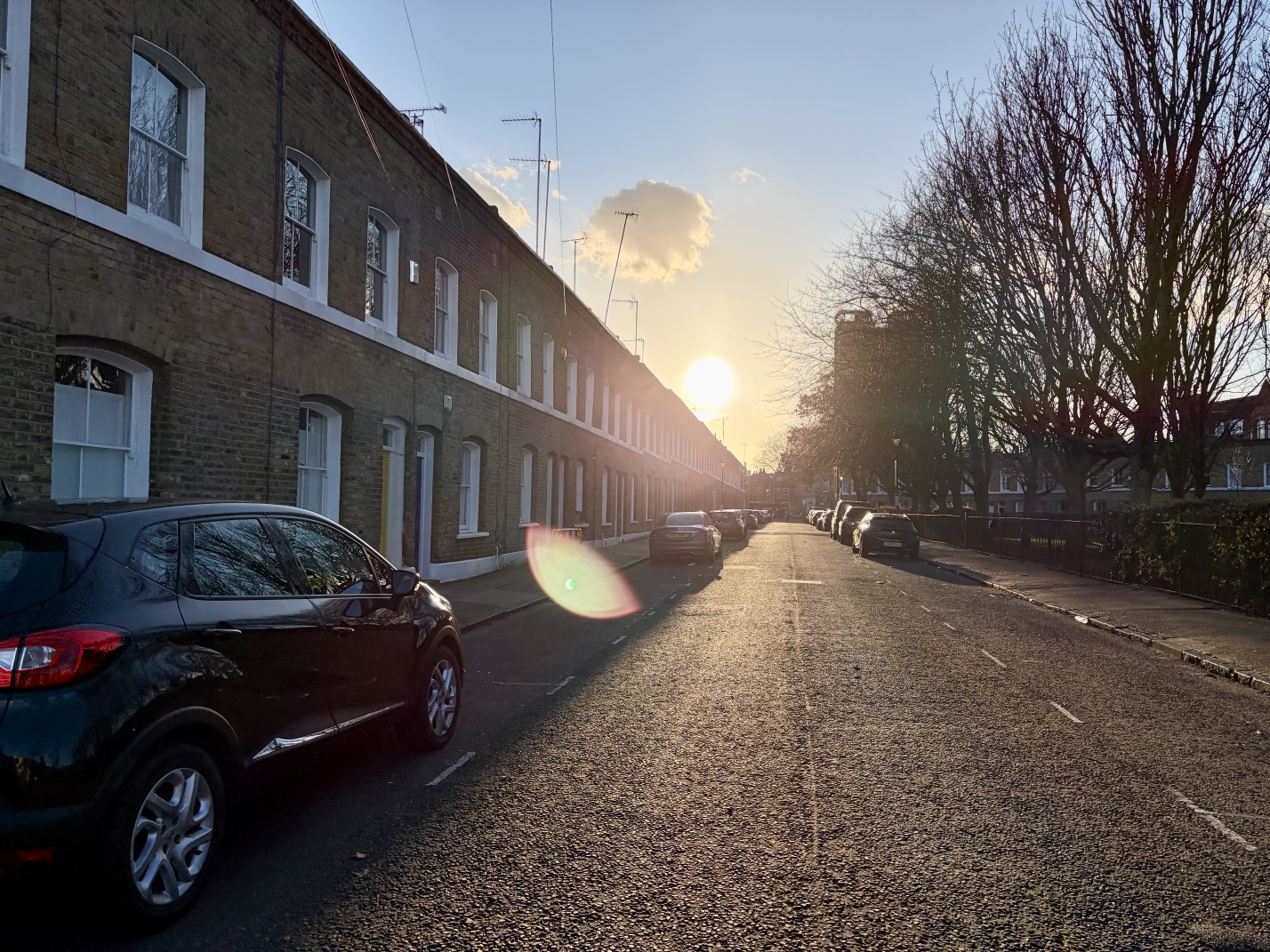 The sun shining on the street