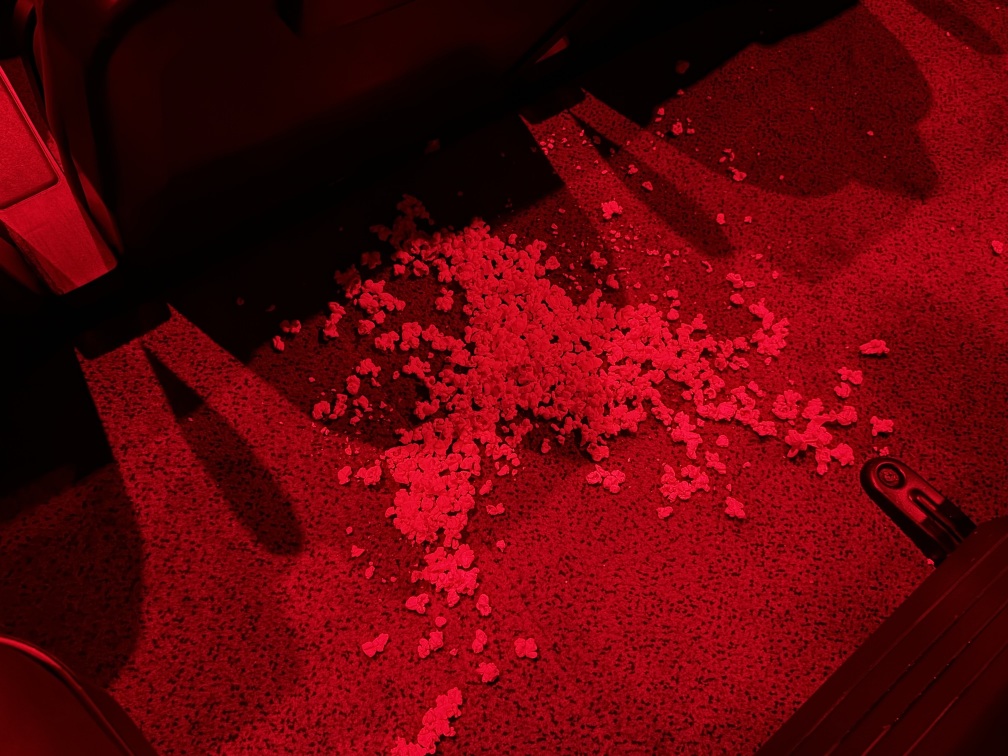 Popcorn spilled all over the floor of the cinema