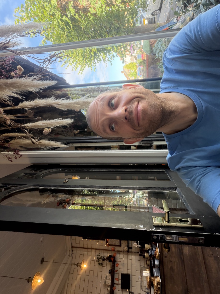 Me sat in the window of Next Door Baker